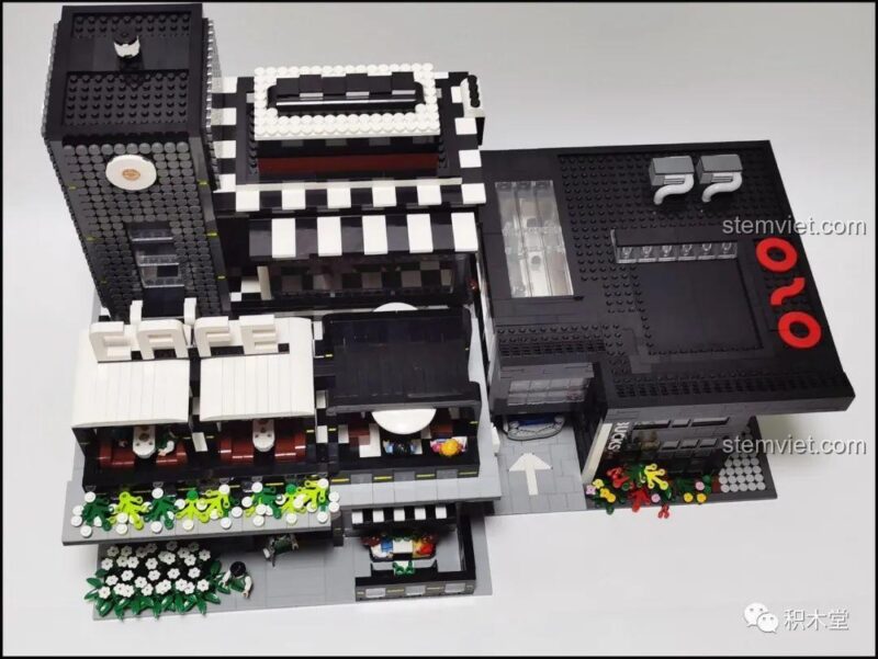 Mảnh ghép điều khiển thang máy lên xuống trong bộ lắp ghép Juhang Technology 86007 Quán Cà Phê Góc Phố, thể hiện cơ chế hoạt động của thang máy.