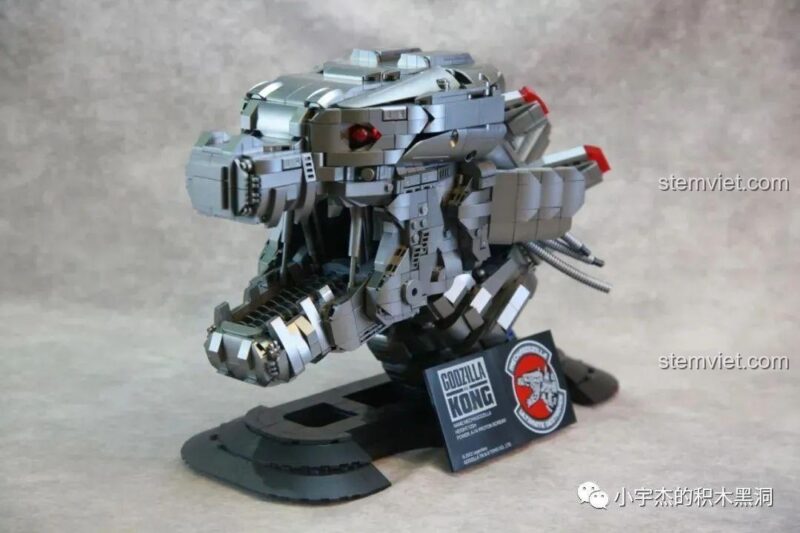 Cận cảnh phần đầu cơ khí hầm hố của đồ chơi mô hình Robot Khủng Long Allosaurus Panlos Brick.