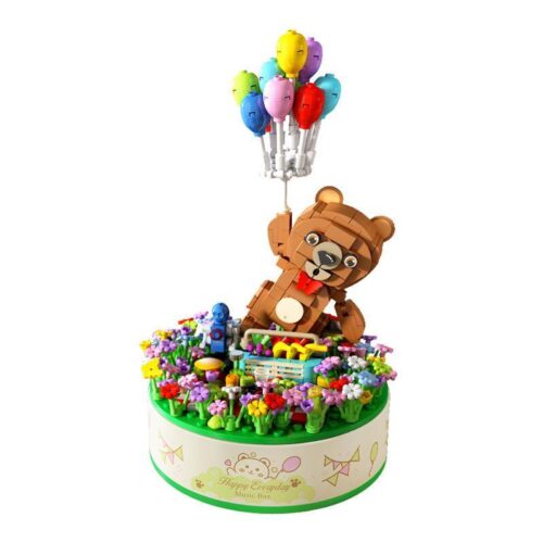 Bộ đồ chơi Hộp nhạc gấu bay PanlosBrick 656010 với mô hình gấu dễ thương và bóng bay nhiều màu sắc, phù hợp cho bé gái 6 tuổi, mang đến giai điệu hạnh phúc.