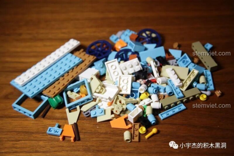 Các chi tiết màu xanh, nâu, trắng của bộ lắp ráp xe bán lẩu cay Sembo 601115.