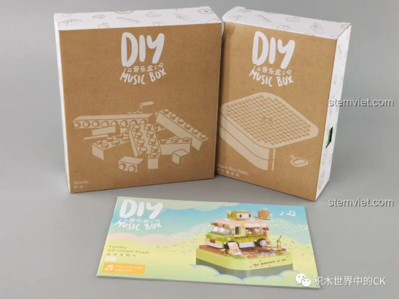 JAKI JK1603 Hộp nhạc chú chó con với bảng hiệu Starbucks, đồ chơi mô hình sáng tạo