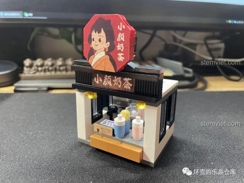 Mô hình quán Trà Sữa Tiểu Nhan của bộ lắp ghép JAKI JK2135 Phố cổ Trường Sa, đồ chơi mô hình Phố ẩm thực Trường Sa, với thiết kế hiện đại.