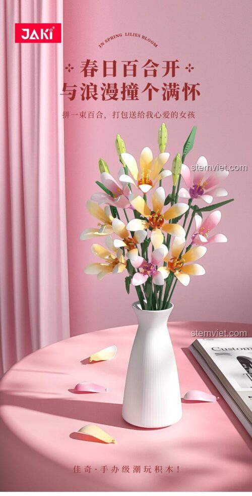 Bó hoa bách hợp lắp ráp JAKI JK26953 được cắm trong bình trắng, thể hiện vẻ đẹp tinh xảo và nghệ thuật, phù hợp làm đồ trang trí cho con gái 14 tuổi.