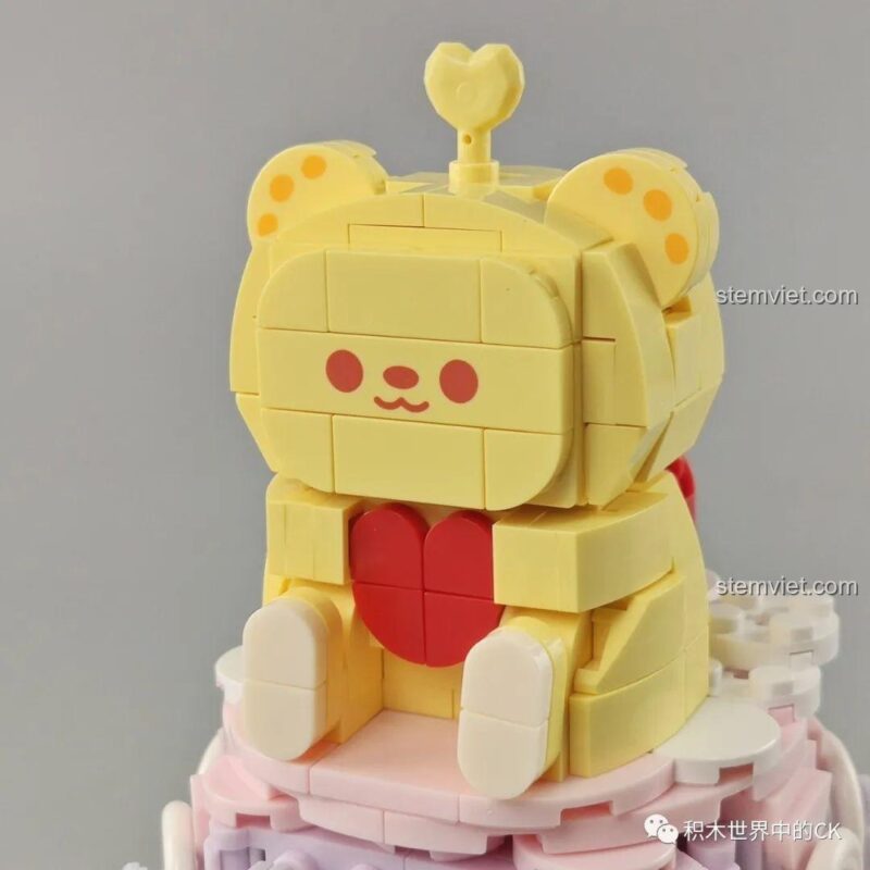Bộ lắp ghép Bánh kem gấu Dooro Bear JAKI JK6180 Hộp nhạc Bánh kem gấu Dooro Bear 369 mảnh ghép màu vàng hồng tím trắng xanh lá cho bé gái 8 tuổi giá tốt