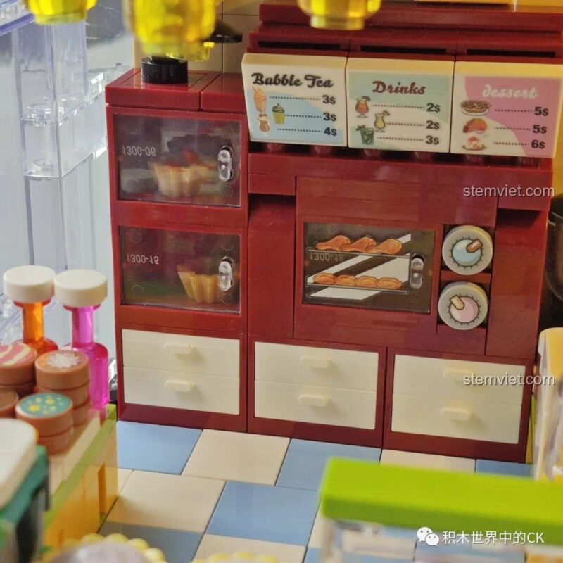 Mô hình kiến trúc cửa hàng JIAZHI SY 5209 cùng các minifigure, tạo nên một khung cảnh sống động và vui nhộn.