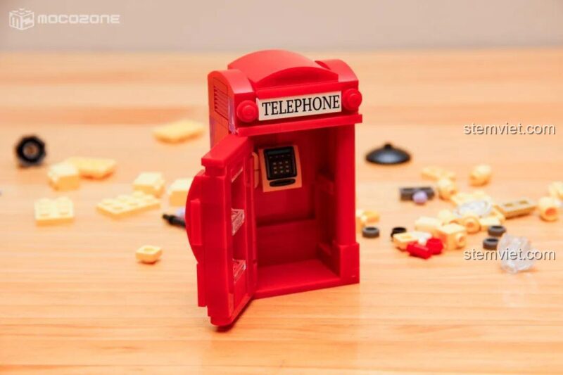 Cận cảnh minifigure Kudo Shinichi và Mouri Ran trong bộ lắp ghép Conan K20705, thể hiện chi tiết trang phục và biểu cảm, cho bé 8 tuổi.