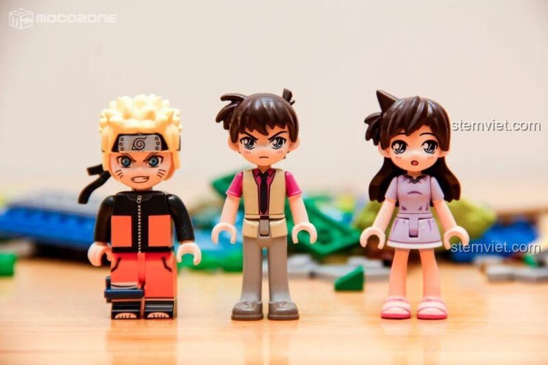 Minifigure Kudo Shinichi và Mouri Ran trong bộ lắp ghép Conan K20705, thể hiện biểu cảm sống động, cho bé 8 tuổi.
