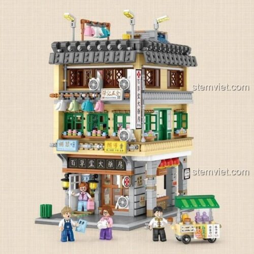 Mô hình Tòa nhà góc phố Hồng Kông 1053 sau khi lắp ráp hoàn chỉnh, thể hiện chi tiết mặt tiền hiệu thuốc và xe đẩy bán hàng.