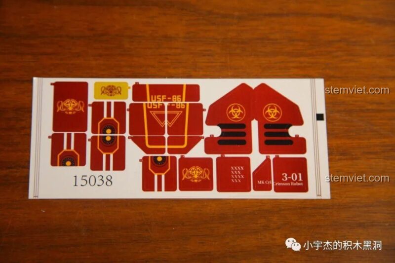 Tờ sticker của bộ đồ chơi Mould King 15038 Robot Crimson, với các chi tiết trang trí, đồ chơi mô hình cho bé trai.