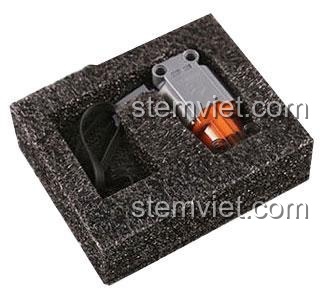 Động cơ Black Furious Mould King M0003 được bảo vệ trong hộp xốp chống sốc.