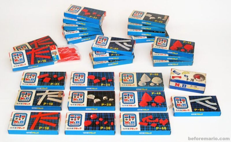 Bộ lắp ghép bổ sung N&B Block P-40 của Nintendo, gồm các chi tiết hình nón và vòm màu đỏ và trắng. Đồ chơi xếp hình cổ điển cho bé 6 tuổi, giúp phát triển sáng tạo.