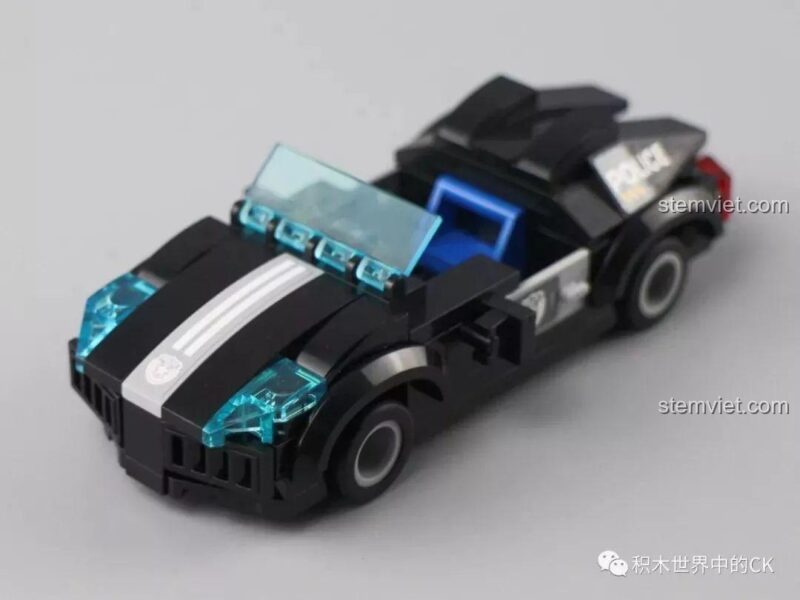 Mặt sau của hai minifigures tội phạm, thể hiện chi tiết trang phục.