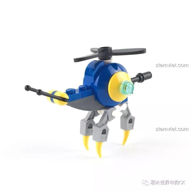 Mô hình máy bay không người lái (drone) từ bộ QMAN 2708, có thiết kế độc đáo với chân nhọn, cánh quạt và vũ khí đi kèm.