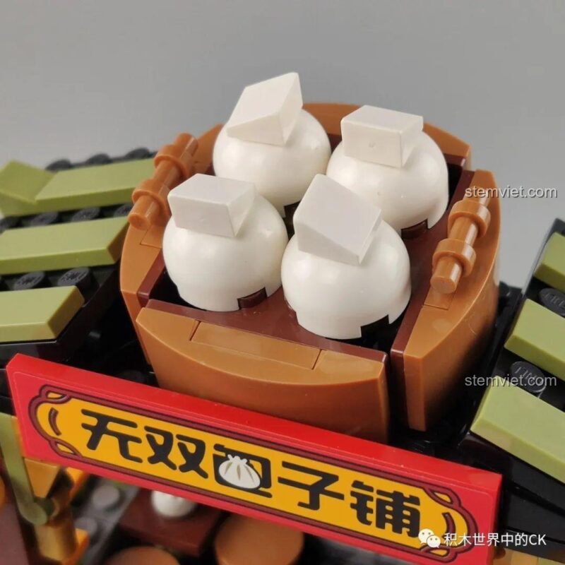Cửa hàng Bánh Bao Mini World ENLIGHTEN, chi tiết bánh bao trên mái nhà, thiết kế độc đáo, đồ chơi xếp hình.