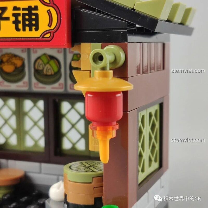 Tiệm Bánh Bao Vô Song QMAN, chi tiết đèn lồng trang trí, màu sắc chủ đạo tươi sáng, đồ chơi lắp ghép cho bé gái.
