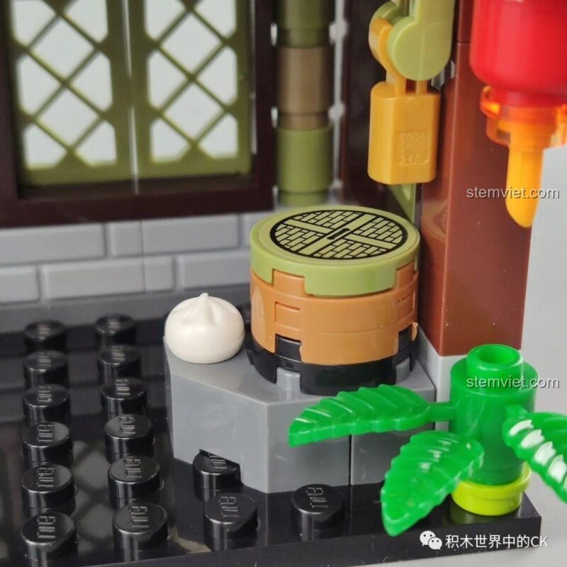 Cửa hàng ẩm thực Mini World 72012, chi tiết bàn ghế và nồi hấp bánh bao, nội thất sống động, đồ chơi lắp ráp.