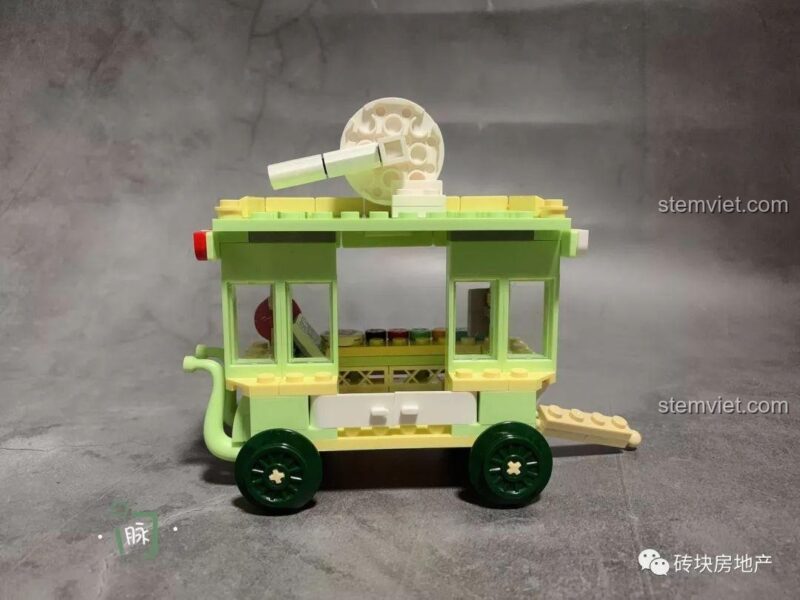 Mô hình lắp ghép xe bán kẹo mút mini Sembo 601112 nhìn từ bên hông.
