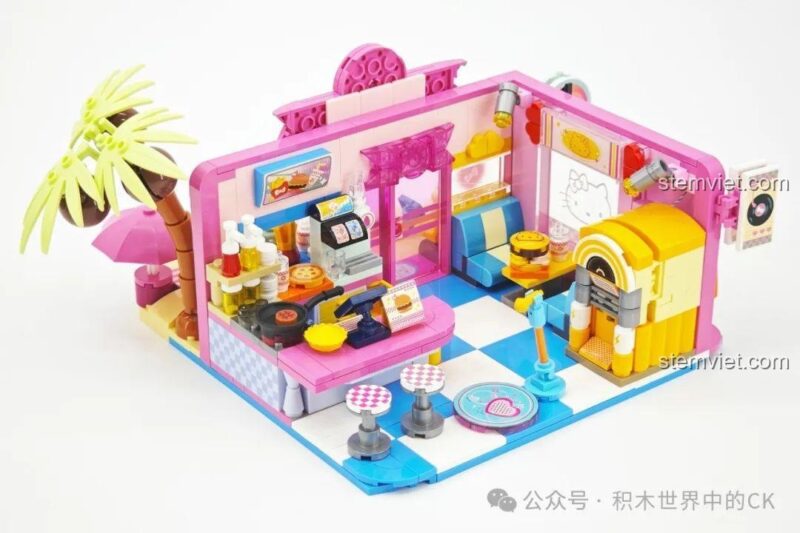 Hello Kitty lướt sóng TOP TOY TC2325, mô hình Hello Kitty da nâu độc đáo đang lướt sóng trên biển xanh, phù hợp bé gái 8 tuổi