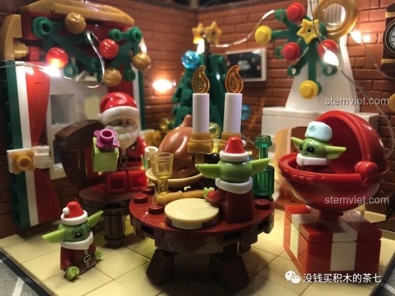 Mô hình cảnh Giáng Sinh Wekki 506001 được trưng bày cùng minifigure Grogu, tạo nên một khung cảnh độc đáo.