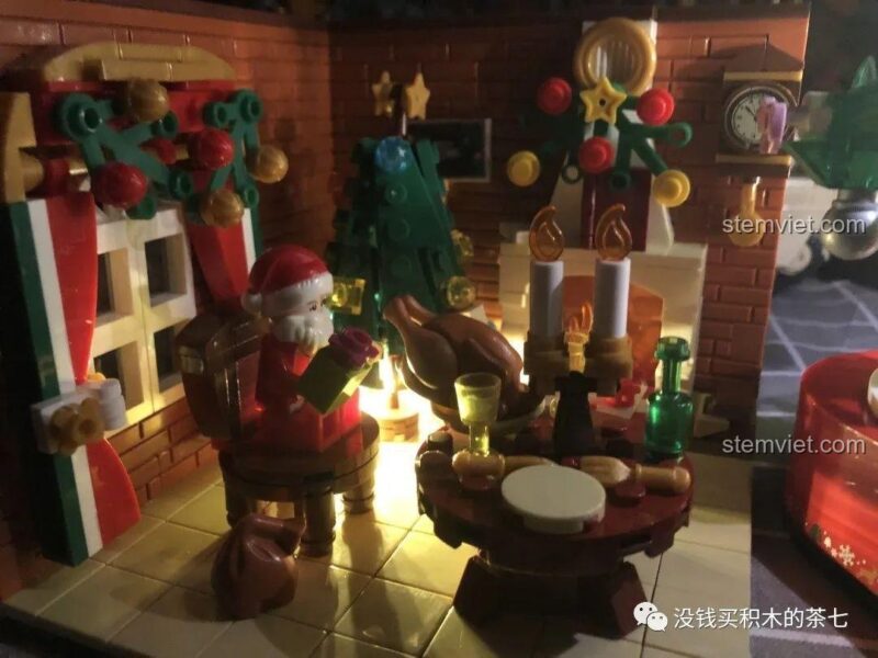 Cảnh Giáng Sinh Ấm Áp Wekki 506118 với Ông già Noel và bàn tiệc, tạo nên không khí lễ hội sống động, set đồ chơi chất lượng cao.