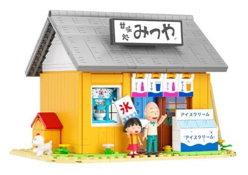 Hình ảnh hộp sản phẩm của bộ đồ chơi Wekki 516409, chủ đề Nhóc Maruko và Tiệm đồ ngọt Mitsuya. Hộp có màu sắc tươi sáng, phù hợp làm quà tặng.