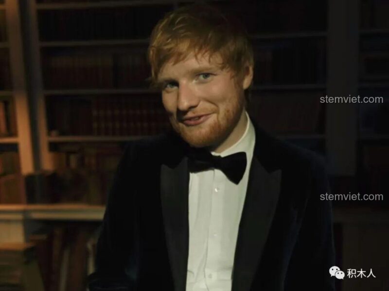 Minifigure Ed Sheeran WM 6093 phiên bản áo khoác xanh dương, đồ chơi mô hình Ed Sheeran với chi tiết giày Nike in ấn