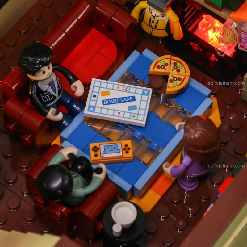 Chi tiết cây đàn piano và ánh đèn ấm cúng bên trong bộ xếp hình Lumibricks 9041.