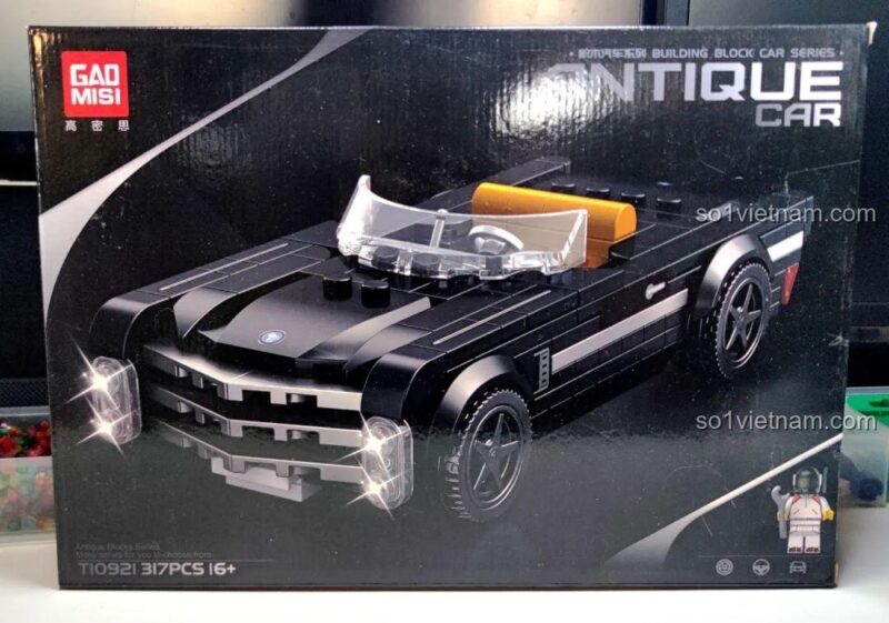 Ảnh chụp thực tế hộp sản phẩm GAOMISI T1092 Xe Cadillac mui trần, thiết kế hộp màu đen huyền bí, chất lượng cao.