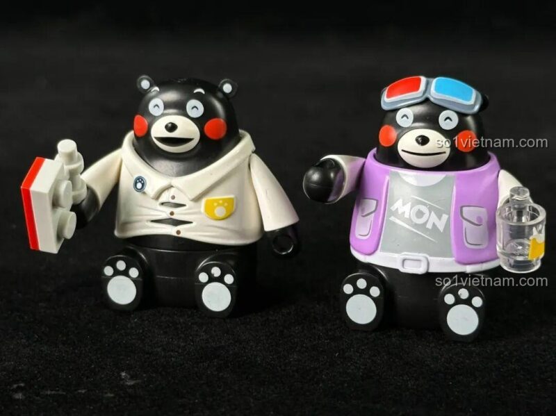 Mô hình tàu hỏa nhỏ trong đồ chơi mô hình Kumamon Cuộc Sống Ở Nhà, tạo điểm nhấn độc đáo cho diorama.