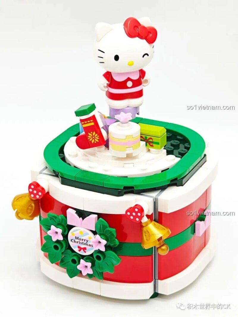 Đế hộp nhạc và 2 minifigures Hello Kitty, Cinnamoroll của bộ đồ chơi Keeppley K20836 Hộp nhạc Giáng Sinh Sanrio Characters