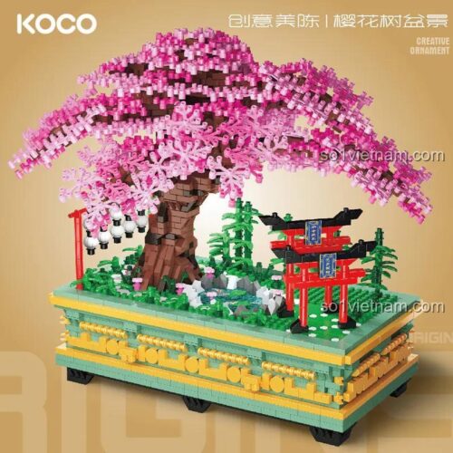 Hộp sản phẩm Cây Anh Đào Bonsai KOCO 04013, có hình ảnh mô hình hoàn thiện, thông tin chi tiết về số mảnh ghép và độ tuổi khuyến nghị