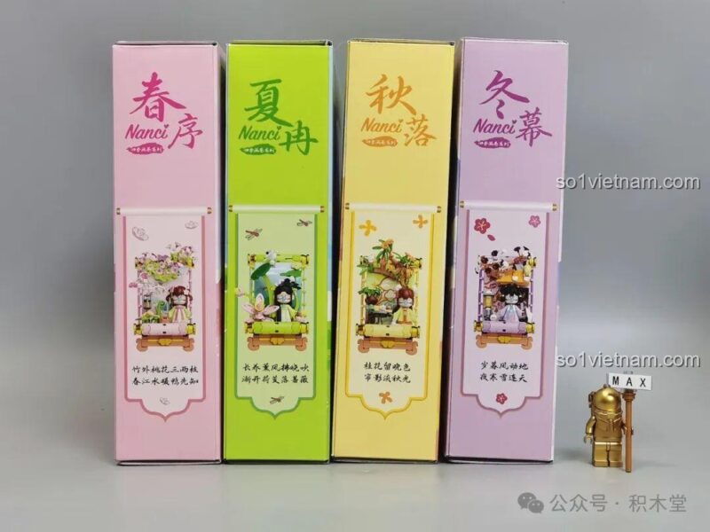 Một cạnh bên khác của hộp sản phẩm TOP TOY TC2053 Bức tranh cuốn Nanci mùa xuân, có in chữ Hán.