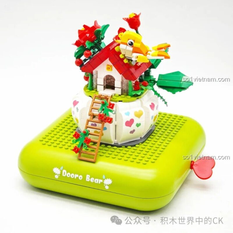 Cơ cấu dây cót hình trái tim của bộ xếp hình Ngôi nhà chim hoa ZHEGAO 663014, đồ chơi có âm thanh cho bé gái.